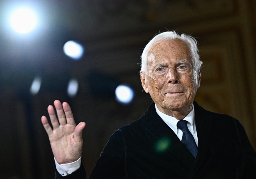 Italian designer Giorgio Armani acknowledges the applause at the end of his presentation for Armani Prive during the Women's Haute-Couture Spring/Summer 2025 Fashion Week to mark its 20th anniversary, in Paris on January 28, 2025.