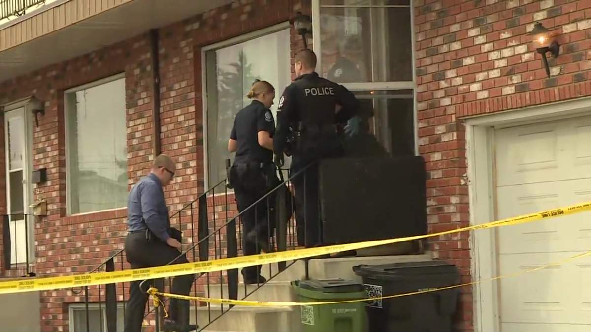 Edmonton Police Service investigators at a home in the Canora neighbourhood on Friday, Sept. 19, 2025.