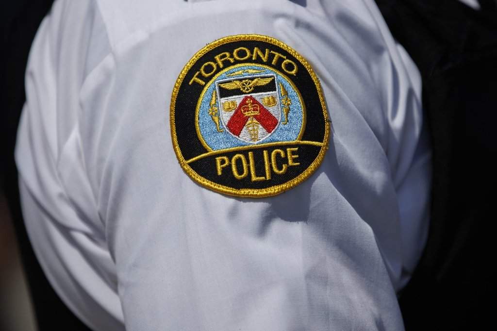 Toronto police say one person is dead after a shooting at a commercial plaza in North York. A Toronto Police emblem is shown in Toronto on Aug. 5, 2022. THE CANADIAN PRESS/Cole Burston.