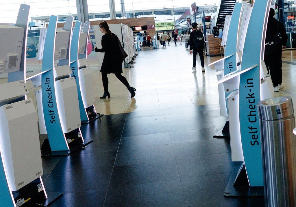 Check-in counters at a terminal at Berlin's Brandenburg airport, in Schönefeld, Germany, Saturday Sept. 20, 2025, after a cyberattack targeting check-in and boarding systems disrupted air traffic at several major European airports.
