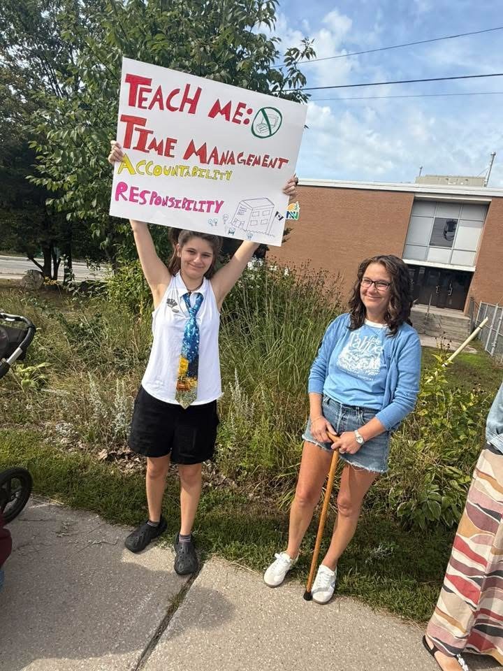 A student in Parry Sound protesting having to learn online amid construction delays.