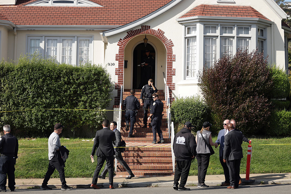 San Francisco Police officers at scene at 930 Monterey Blvd. in San Francisco, where four people were found dead on Wednesday, October 8, 2025.