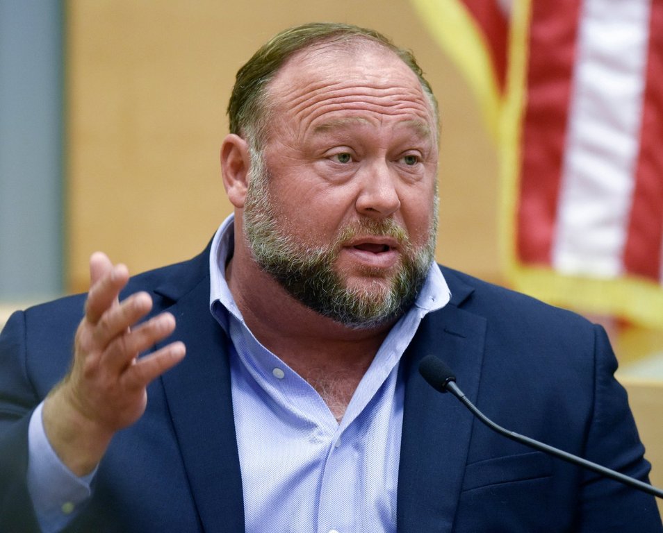 Conspiracy theorist Alex Jones takes the witness stand to testify at the Sandy Hook defamation damages trial at Connecticut Superior Court in Waterbury, Conn., Sept. 22, 2022.