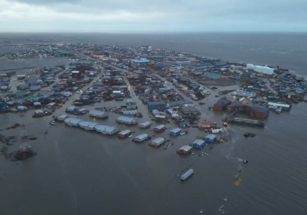In this aerial photo provided by the Alaska Department of Transportation and Public Facilities, the city of Kotzebue, Alaska experiences flooding, Wednesday, Oct. 8, 2025.