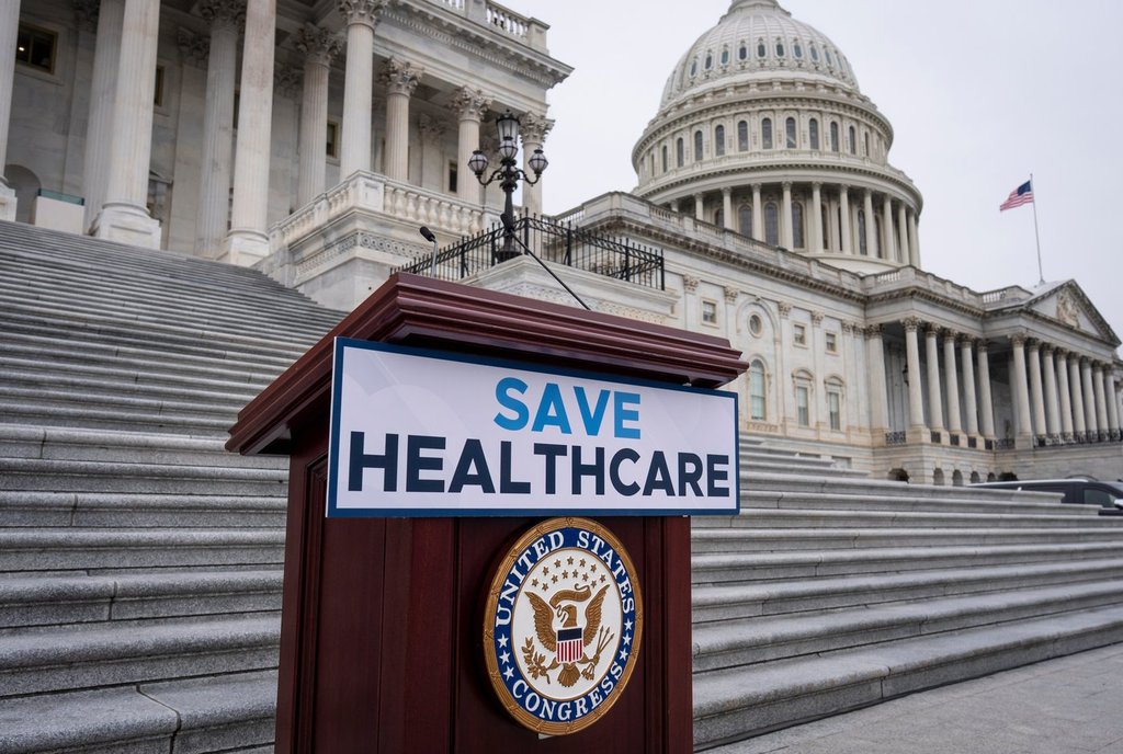 House Democrats prepare to speak on the steps of the Capitol to insist that Republicans include an extension of expiring health care benefits as part of a government funding compromise, in Washington, Tuesday, Sept. 30, 2025. (AP Photo/J. Scott Applewhite).