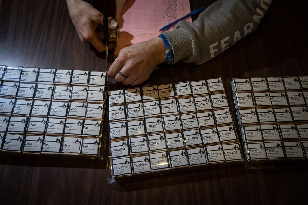 A tested supply of cocaine, heroin and methamphetamine is readied for distribution to drug users after a gathering to remember those who died from a suspected illicit drug overdose, in Vancouver, on Wednesday, February 9, 2022. The Drug User Liberation Front (DULF), Vancouver Area Network of Drug Users (VANDU) and B.C. Association of People on Opiate Maintenance distributed a tested supply of illicit drugs to users after the gathering in a call for a safer drug supply. THE CANADIAN PRESS/Darryl Dyck.