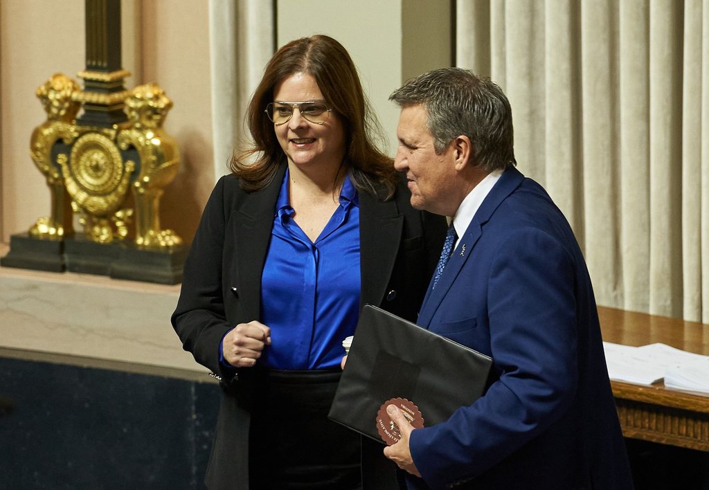 Manitoba Premier Heather Stefanson and Finance Minister Cliff Cullen chat before Cullen delivers the 2023 budget in the Manitoba Legislative Building, in Winnipeg on Tuesday, March 7, 2023. THE CANADIAN PRESS / David Lipnowski.