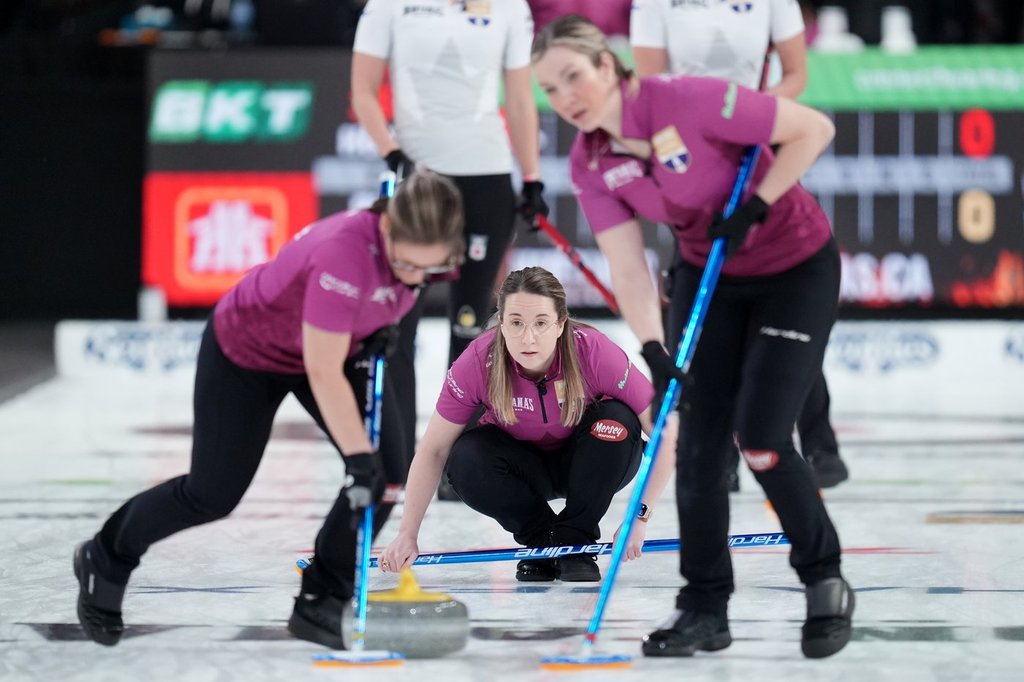 Skip Christina Black, centre, watches her shot during Game 1 of the Montana's Canadian Curling Trials final against Team Homan in Halifax on Nov. 28, 2025. THE CANADIAN PRESS/Darren Calabrese.