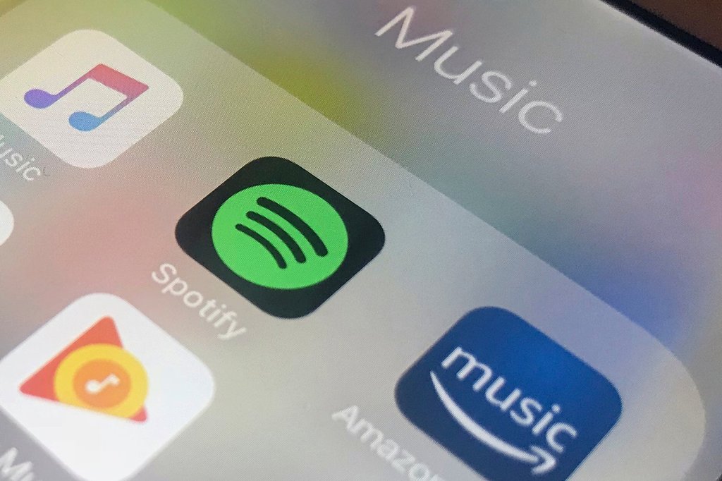 FILE - Music streaming apps are shown on cellphone in New York. (AP Photo/Jenny Kane, File).