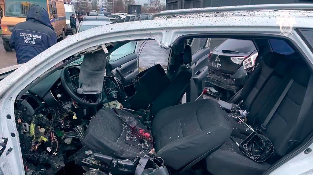 This image taken from video provided by Investigative Committee of Moscow on Monday, Dec. 22, 2025, shows the scene where Lt. Gen. Fanil Sarvarov, head of the Operational Training Directorate of the Russian Armed Forces General Staff, was killed by an explosive device placed under his car in Moscow.