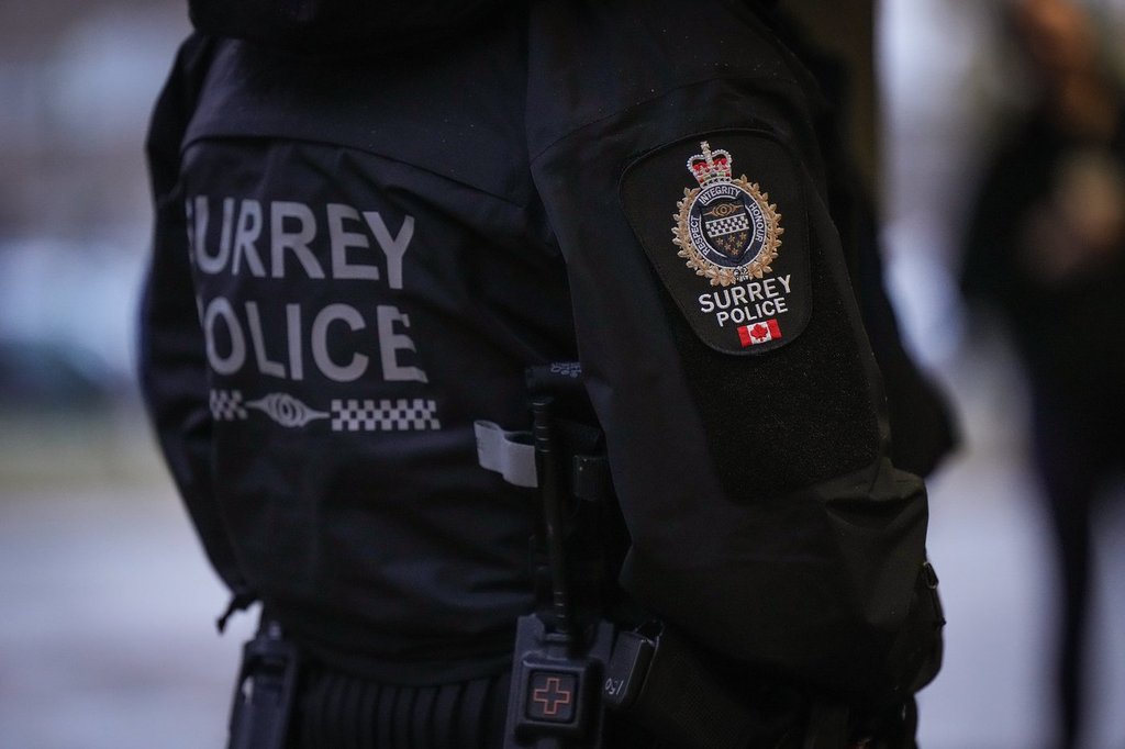A Surrey police department logo is seen on an officer's jacket in Surrey, B.C., Monday, Oct. 31, 2022. 
