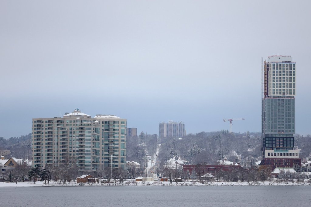 Snowbanks line a Barrie, Ont., street as crews continue round-the-clock snow removal during a prolonged significant weather event.