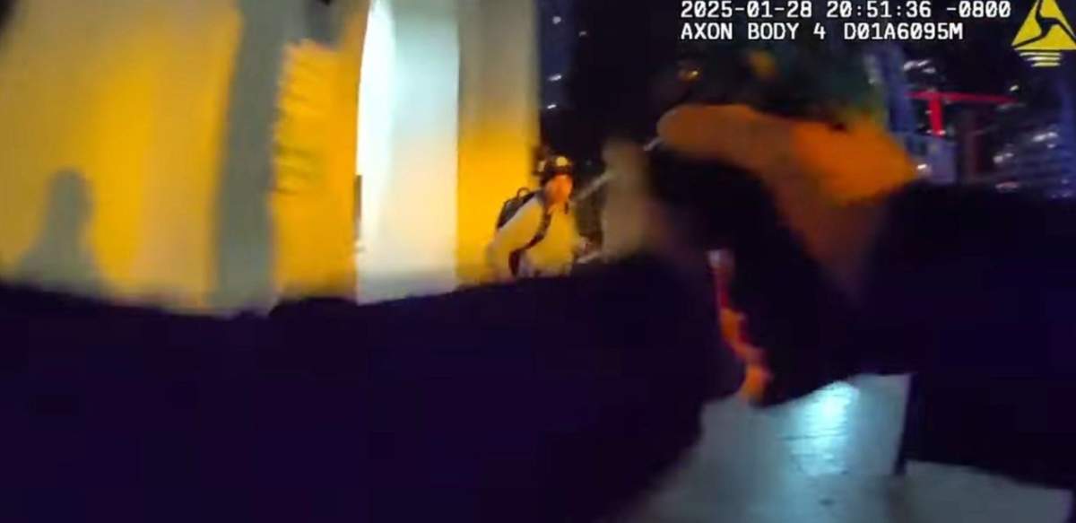 This photo, taken from a body-worn camera video, shows the moment before a San Diego Police Officer fatally shot 16-year-old Konoa Wilson as he ran away from gunfire on Jan. 28, 2025.