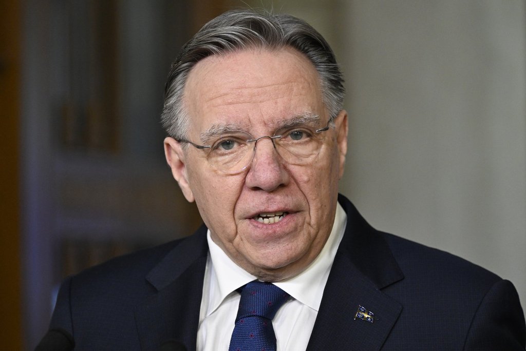 Quebec Premier François Legault announces his resignation during a news conference in Quebec City, Wednesday, Jan. 14, 2026.
