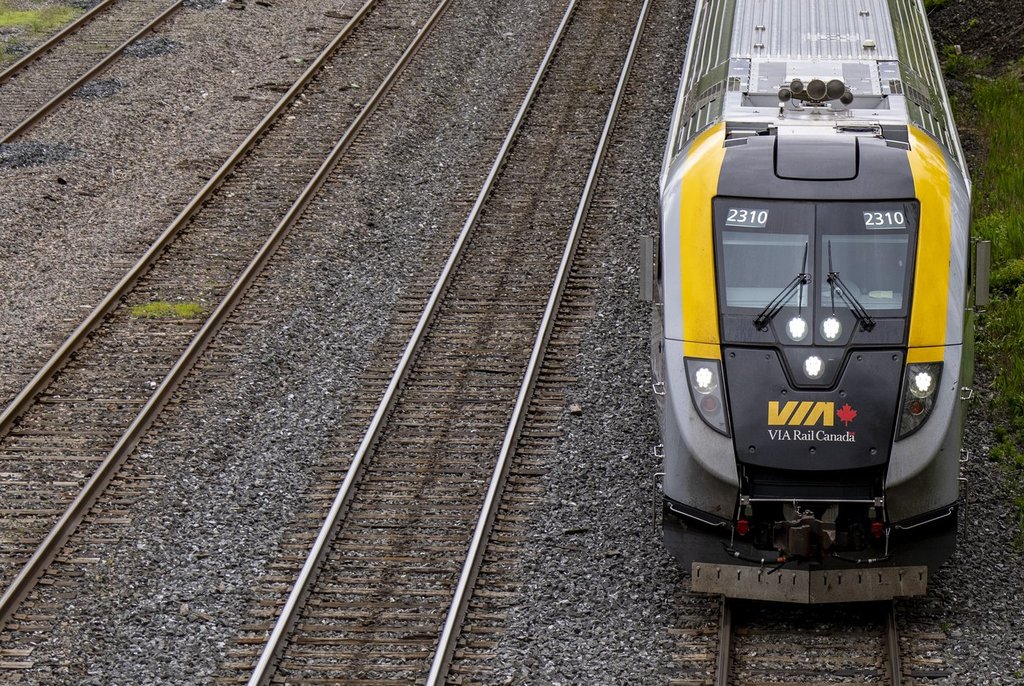 A VIA Rail train struck a snowplow in Scarborough, causing major VIA and GO Transit delays. No injuries were reported and tracks have since reopened. 