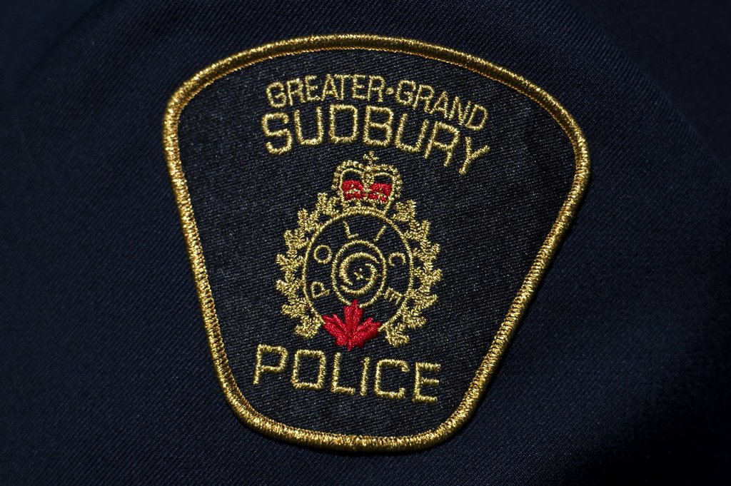 A 33-year-old man has been arrested and charged with first-degree murder after a fatal tent fire in Sudbury.