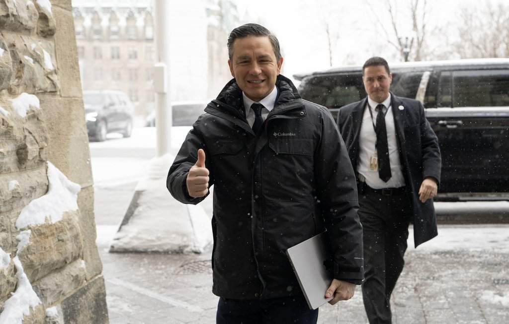 Conservative Leader Pierre Poilievre arrives on Parliament Hill, Tuesday, Jan. 27, 2026 in Ottawa. 