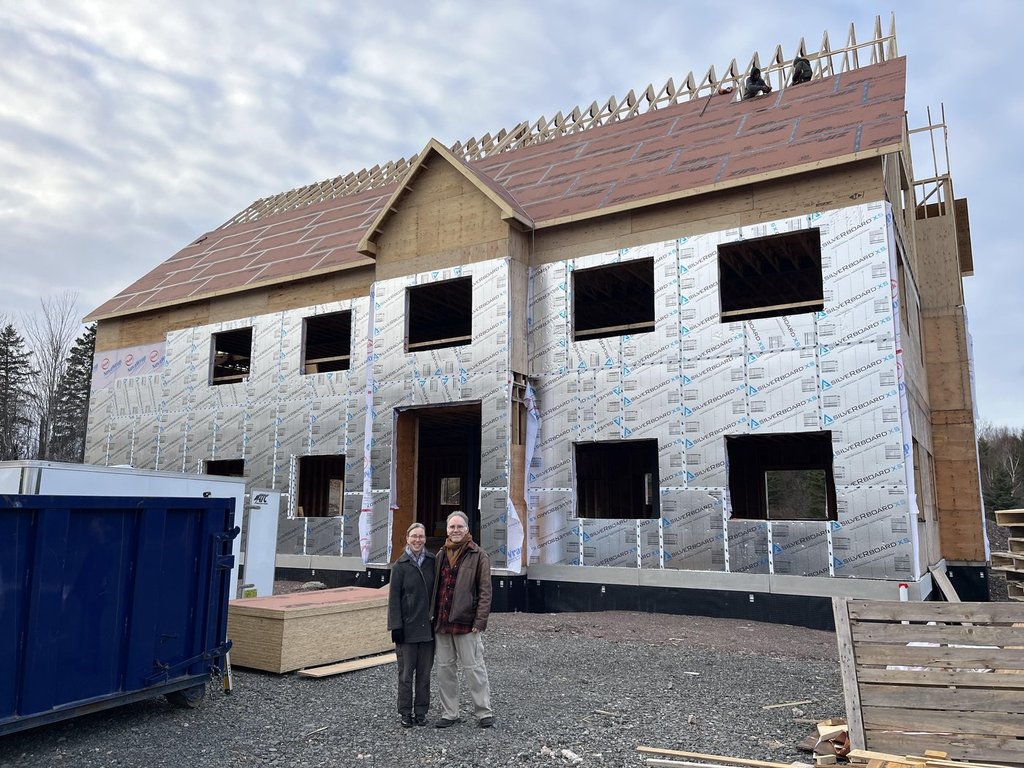 Amy Hendricks and Paul Davie stand in front of what will become a medical clinic in the planned community of Sugarloaf, in this undated handout photo in Antigonish, N.S. Hendricks and Davie have already donated land for affordable and transitional housing to local non-profits. THE CANADIAN PRESS/Handout - Amy Hendricks and Paul Davie (Mandatory Credit).