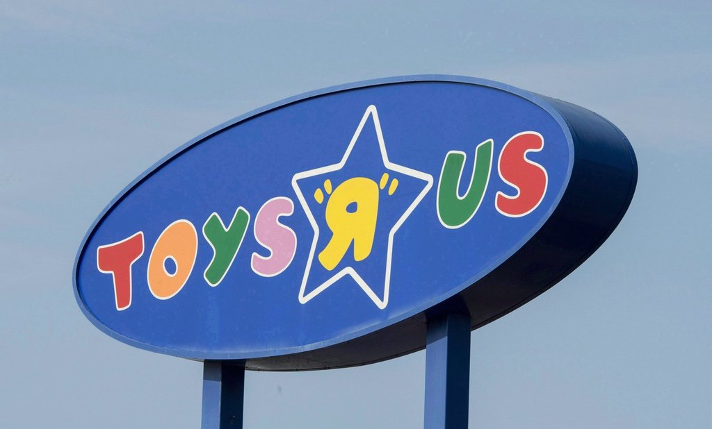 A Toys "R" Us sign is seen in Montreal on Sept. 19, 2017. THE CANADIAN PRESS/Paul Chiasson.