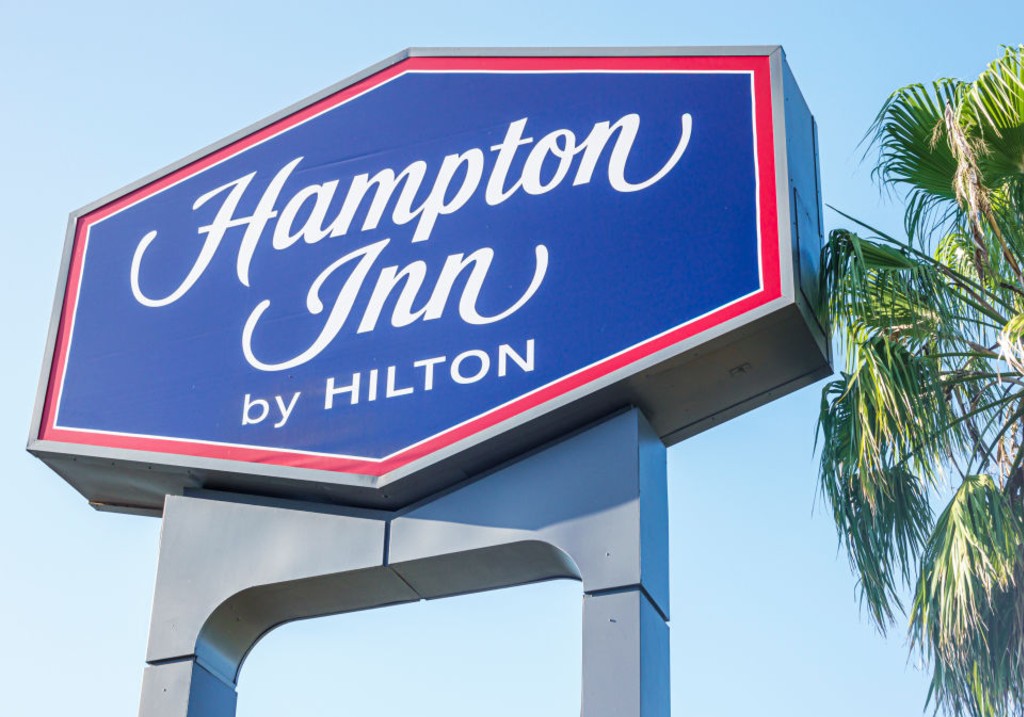 A file photo of a Hampton Inn by Hilton hotel sign.