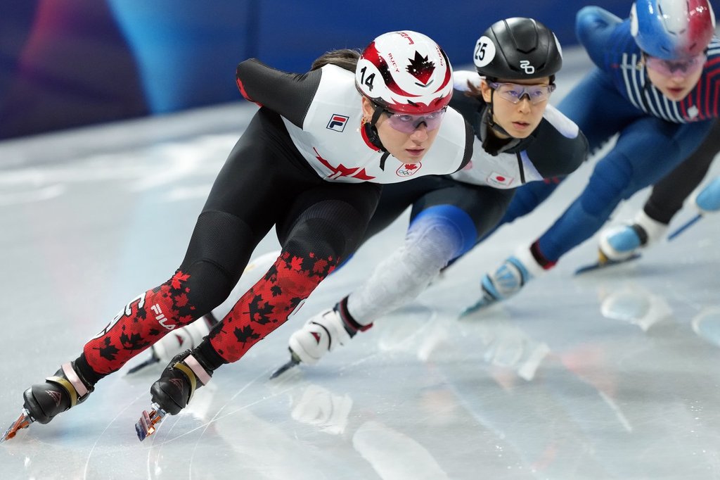 Canada's Courtney Sarault competes in the women's 1000m Short Track Speed Skating event during the 2026 Milan Cortina Winter Olympics in Milan, Italy on Saturday, February 14, 2026. THE CANADIAN PRESS/Nathan Denette.