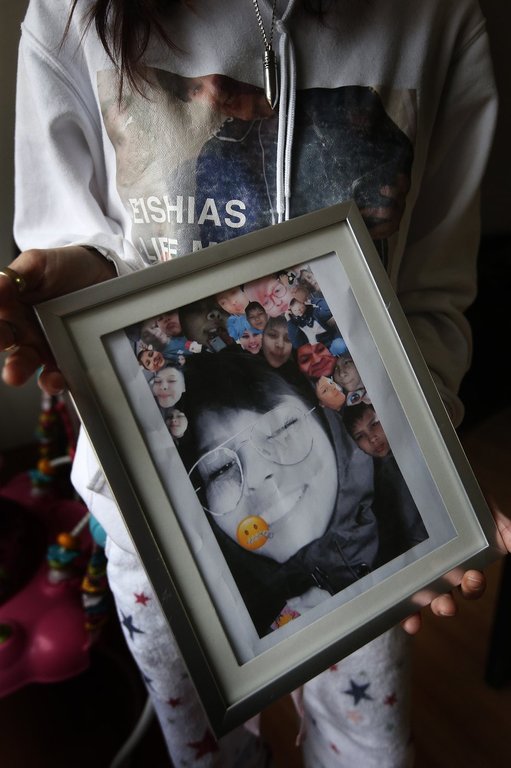 Christie Zebrasky, whose daughter Eishia Hudson was shot dead by police on April 8, 2020, holds a photo of her daughter in Winnipeg, Friday, December 11, 2020.  