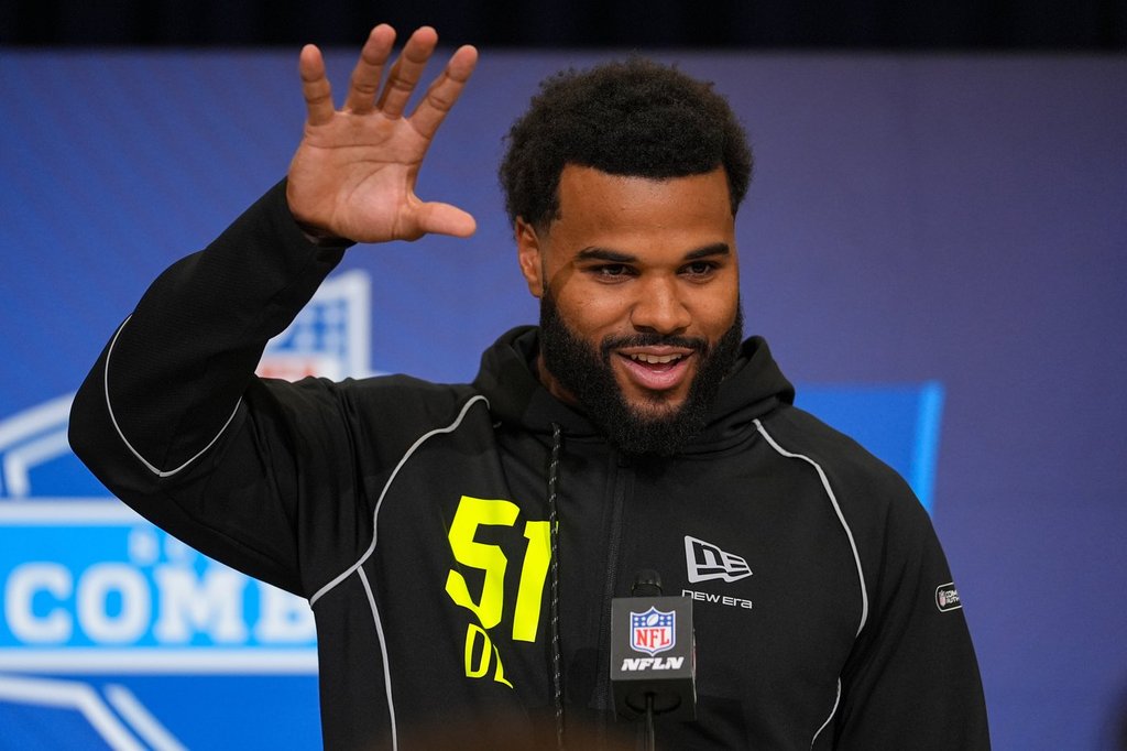 Miami defensive lineman Akheem Mesidor (51) speaks during a press conference at the NFL football scouting combine in Indianapolis, Wednesday, Feb. 25, 2026. (AP Photo/Michael Conroy).
