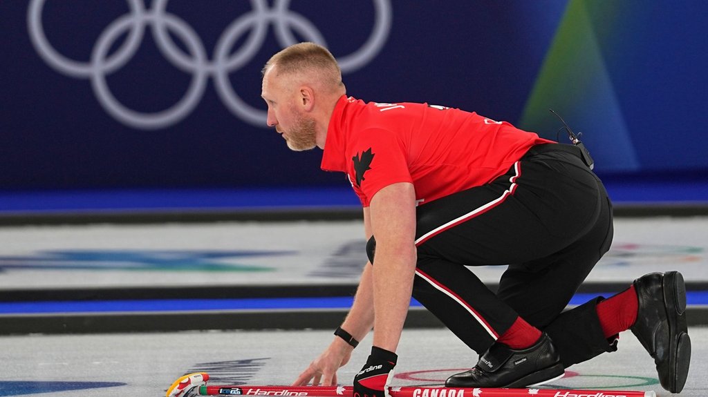 Canada's Brad Jacobs in action during the men's curling round robin session against Britain at the 2026 Winter Olympics, in Cortina d'Ampezzo, Italy, Tuesday, Feb. 17, 2026. (AP Photo/Fatima Shbair).