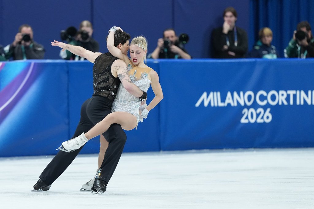 Piper Gilles and Paul Poirier of Team Canada compete in the Figure Skating Ice Dance Rhythm Dance event during the 2026 Milan Cortina Winter Olympics in Milan, Italy on Monday, February 9, 2026. THE CANADIAN PRESS/Nathan Denette.