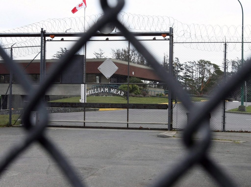 William Head Institution is shown through a security fence in Victoria, B.C., on Wednesday, Feb. 27, 2008. THE CANADIAN PRESS/Adrian Lam.