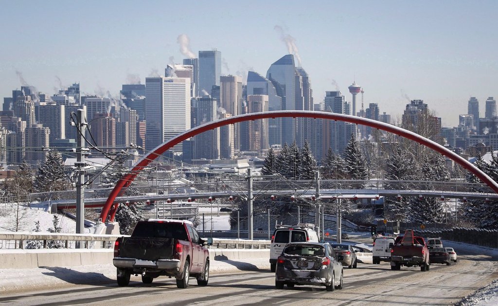 Highway traffic moves into Calgary, Alta., Wednesday, Feb. 8, 2017. THE CANADIAN PRESS/Jeff McIntosh.