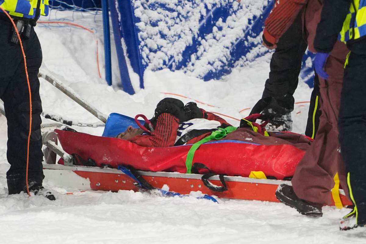 Medical personnel stretcher Canada’s Mark McMorris off after crashing during a snowboard big air training session at the 2026 Winter Olympics, in Livigno, Italy, Wednesday, Feb. 4, 2026.