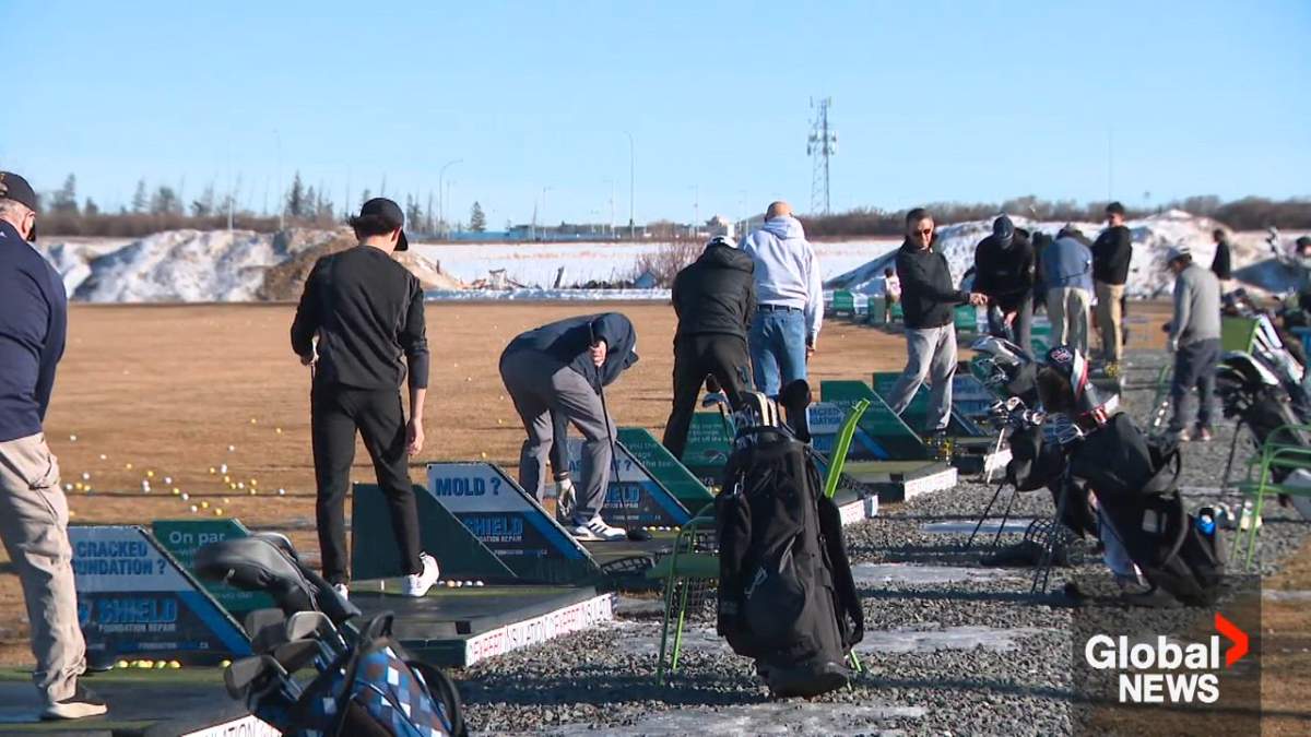 Golfers taking advantage of the warm weather and early opening of the Canada Golf Card driving range on Ellerslie Road in southwest Edmonton on