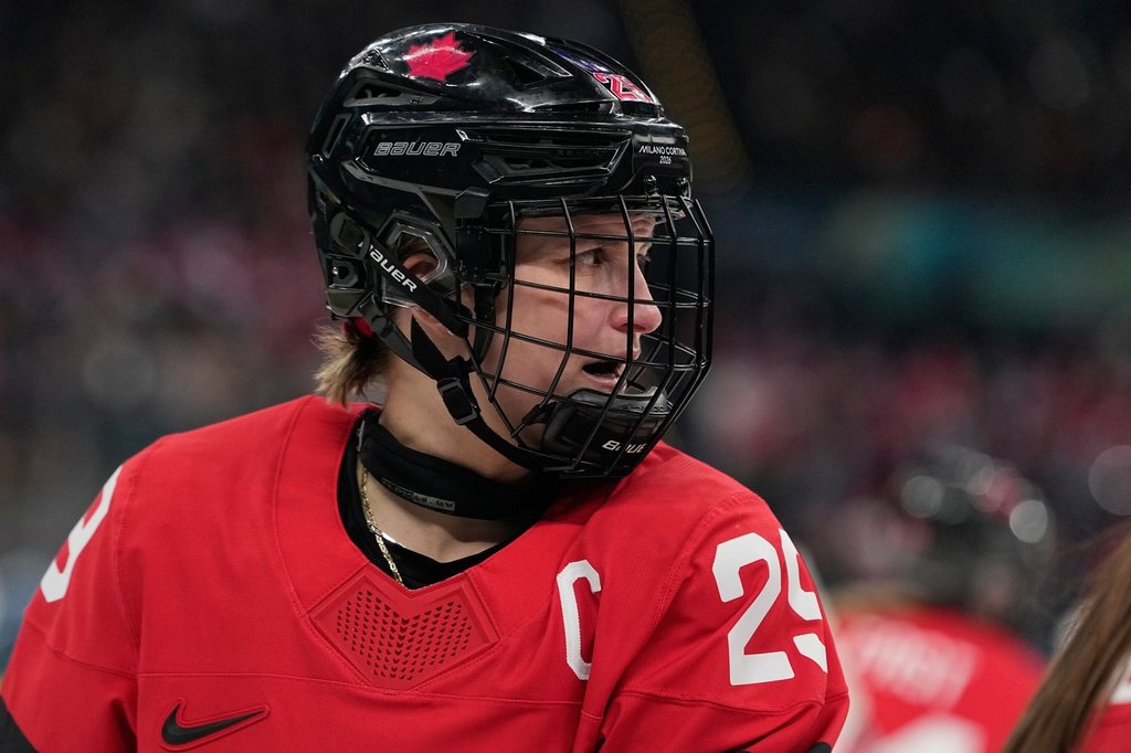 Canada's Marie-Philip Poulin (29) reacts a women's ice hockey semifinal game between Canada and Switzerland at the 2026 Winter Olympics, in Milan, Italy, Monday, Feb. 16, 2026. (AP Photo/Hassan Ammar).