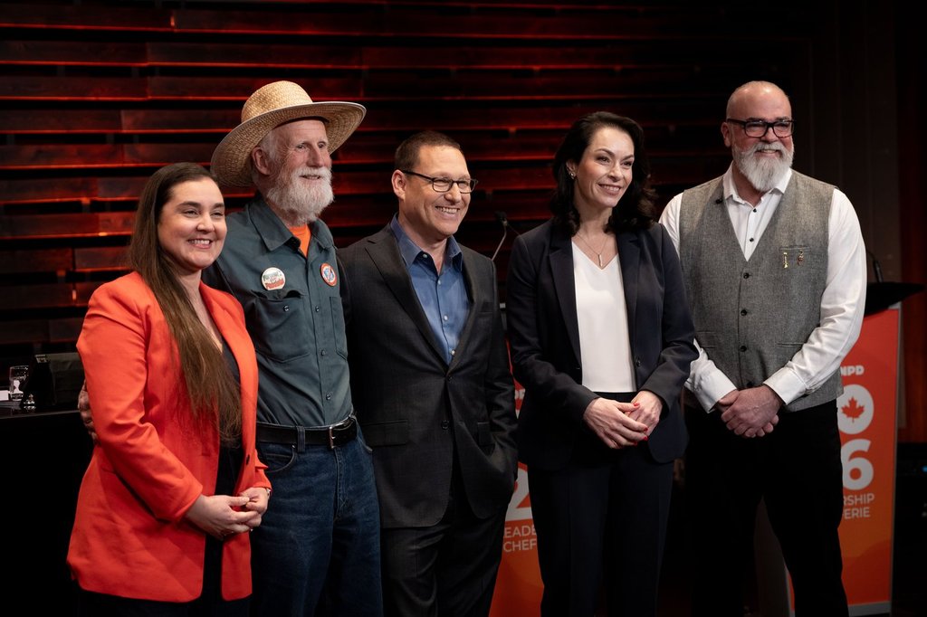 NDP leadership candidates Tanille Johnston from left to right, Tony McQuail, Avi Lewis, Heather McPherson and Rob Ashton, pose for a photo after the NDP English language leadership debate, in New Westminster, B.C., on Thursday, Feb. 19, 2026. 