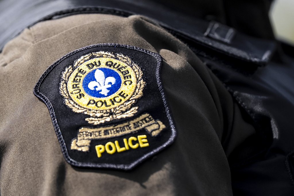 Quebec provincial police badge on a police officer's uniform in Vaudreuil-Dorion, Wednesday, 17 September 2025. 