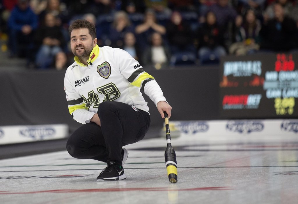 Matt Dunstone, skip of Team Manitoba-Dunstone, watches his last stone of the 10th End during the semifinal against Team Canada at the Montana's Brier Canadian men's curling championship, in St. John's, N.L., on Sunday, March 8, 2026. THE CANADIAN PRESS/Paul Daly.
