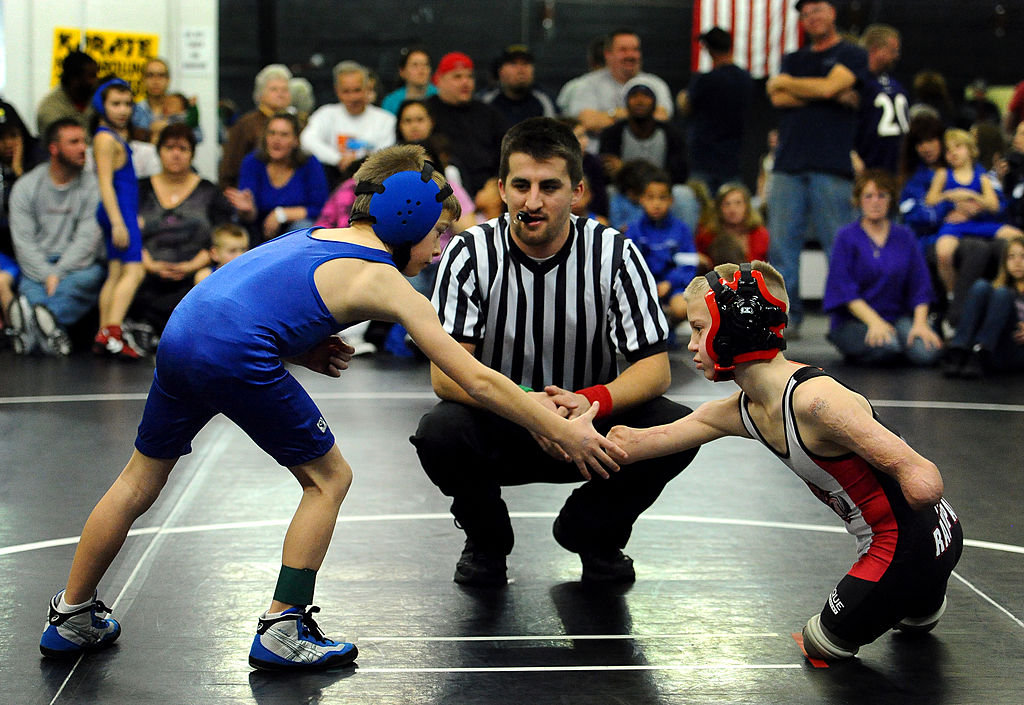 Dayton James Webber shakes hands with his opponent, Mac Scott, before their match on June 22, 2010.