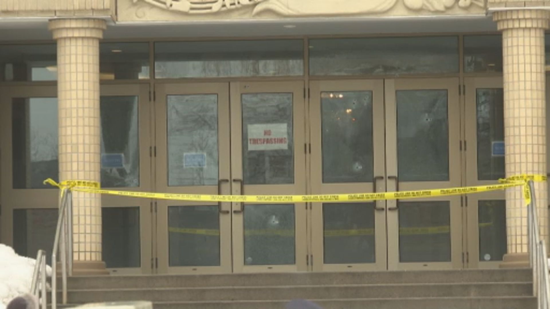 Police tape outside synagogue in Thornhill, Ont. struck by bullets following start of Iran war.