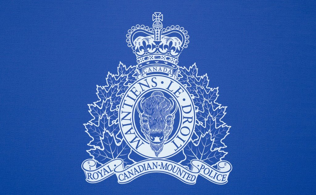 An RCMP logo is seen at a news conference, in St. John's, N.L., Saturday, June 24, 2023. THE CANADIAN PRESS/Adrian Wyld.