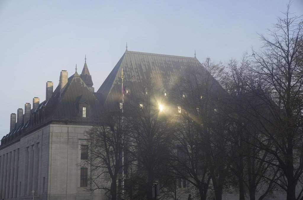The Supreme Court of Canada is shrouded in fog in Ottawa on Friday, Nov. 4, 2022. THE CANADIAN PRESS/Sean Kilpatrick.