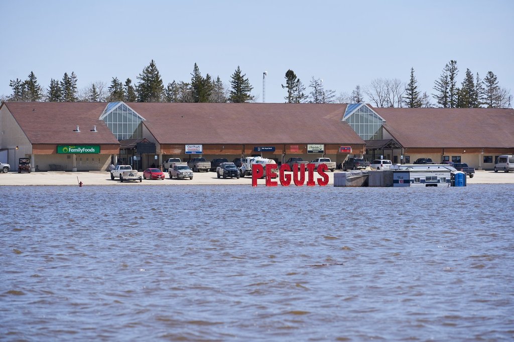 The chief of Peguis First Nation says he is monitoring conditions closely, as crews work to avoid facing a similar situation to that of 2022. Flooding is shown in Peguis First Nation, Man., Wednesday, May 4, 2022. THE CANADIAN PRESS/David Lipnowski