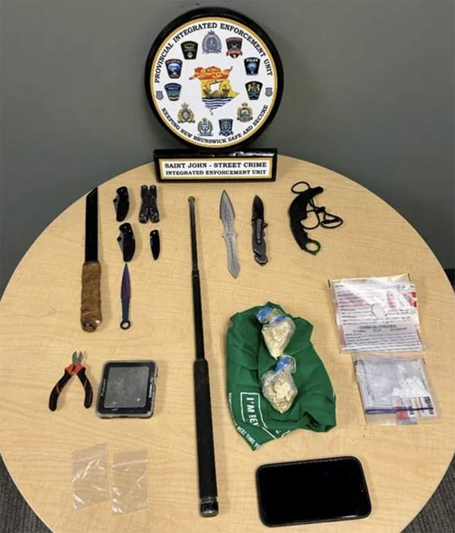 Police in Saint John, N.B., say they seized what they believed were illicit substances, along with several other items, shown in this undated handout photo, during arrests in a drug trafficking investigation, on Monday, April 27, 2026. THE CANADIAN PRESS/Handout-Saint John Police Force (Mandatory credit).
