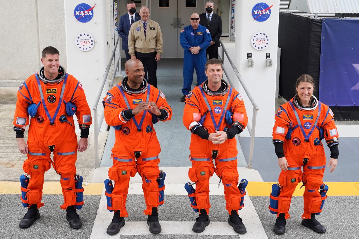 Astronauts, from left, Canadian Space Agency astronaut Jeremy Hansen, pilot Victor Glover, commander Reid Wiseman and mission specialist, Christina Koch leave the Operations and Checkout building on their way to Launch Pad 39B for a planned liftoff on NASA’s Artemis II moon rocket at the Kennedy Space Center, Wednesday, April 1, 2026, in Cape Canaveral, Fla. (AP Photo/John Raoux)