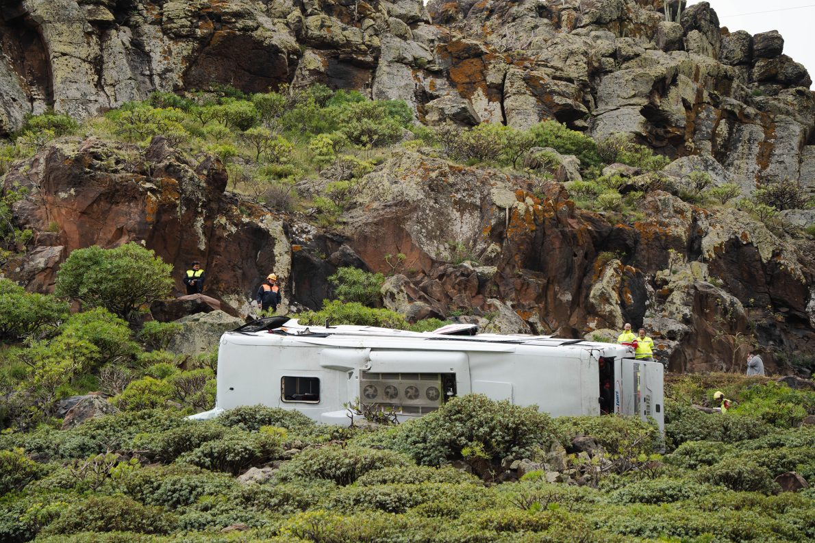 Rescuers work at the scene of a bus crash near in San Sebastian de La Gomera, in Spain’s Canary Islands, Friday, April 10, 2026. (Europa Press Canarias/Europa Press via AP)