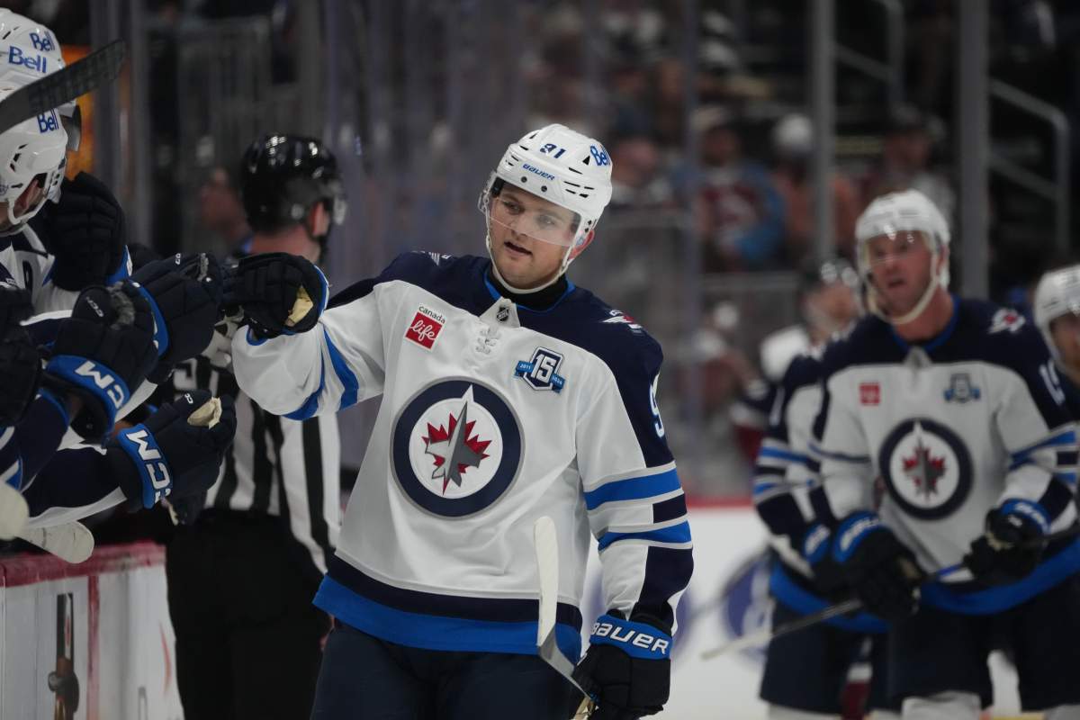 Winnipeg Jets centre Cole Perfetti (91) in the third period of an NHL hockey game Saturday, March 28, 2026, in Denver.