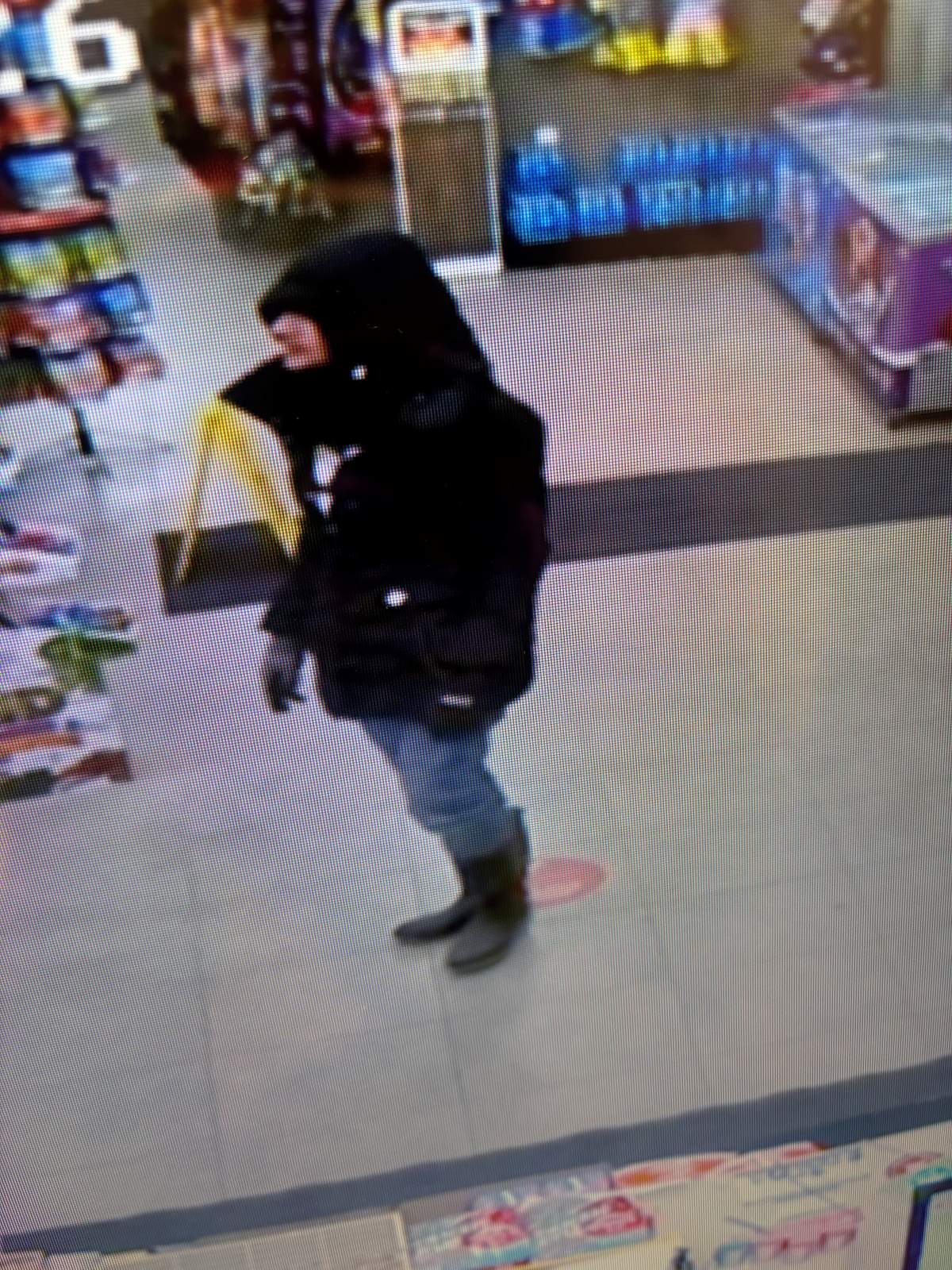 Alberta RCMP have released several photos of a suspect believed to be involved in the killing of a man in Peace River early Thursday morning.