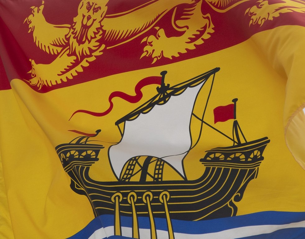 New Brunswick's provincial flag flies on a flagpole in Ottawa, Friday, July 3, 2020. THE CANADIAN PRESS/Adrian Wyld.