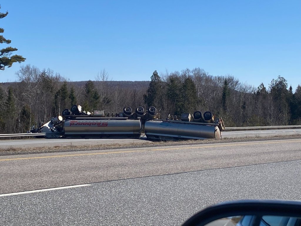 A tanker truck that rolled over and spilled 36,000 litres of fuel on Route 1 about 30 minutes north of Saint John, N.B., on Wednesday, April 8, 2026, is shown in this handout photo. THE CANADIAN PRESS/Handout — Kelly Shortall Ryan (Mandatory Credit).