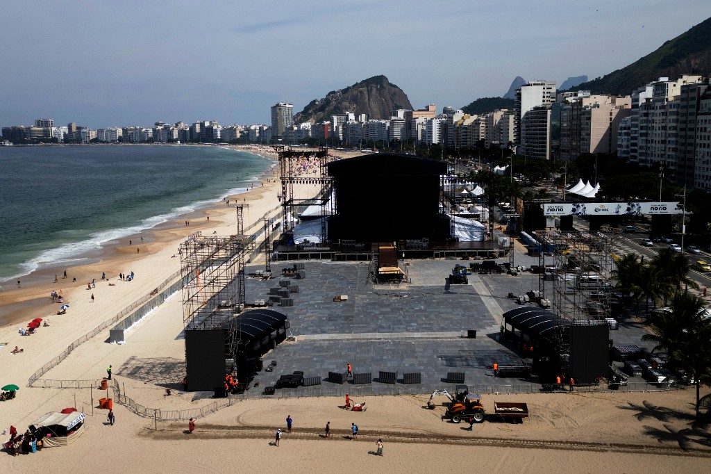 Workers prepare the stage for a concert by Colombian pop star Shakira at Copacabana Beach in Rio de Janeiro, Monday, April 27, 2026.